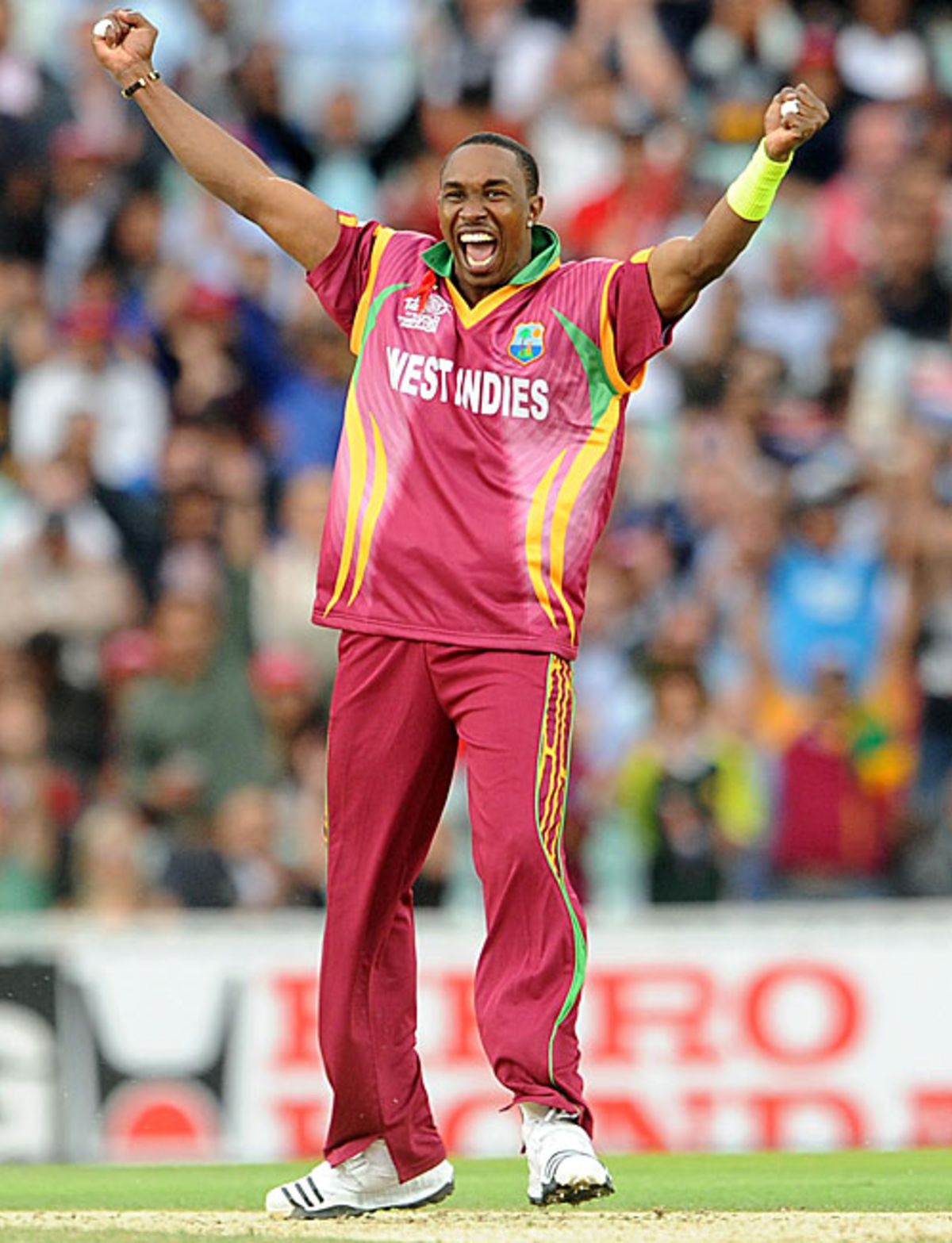 Dwayne Bravo celebrates a doublestrike