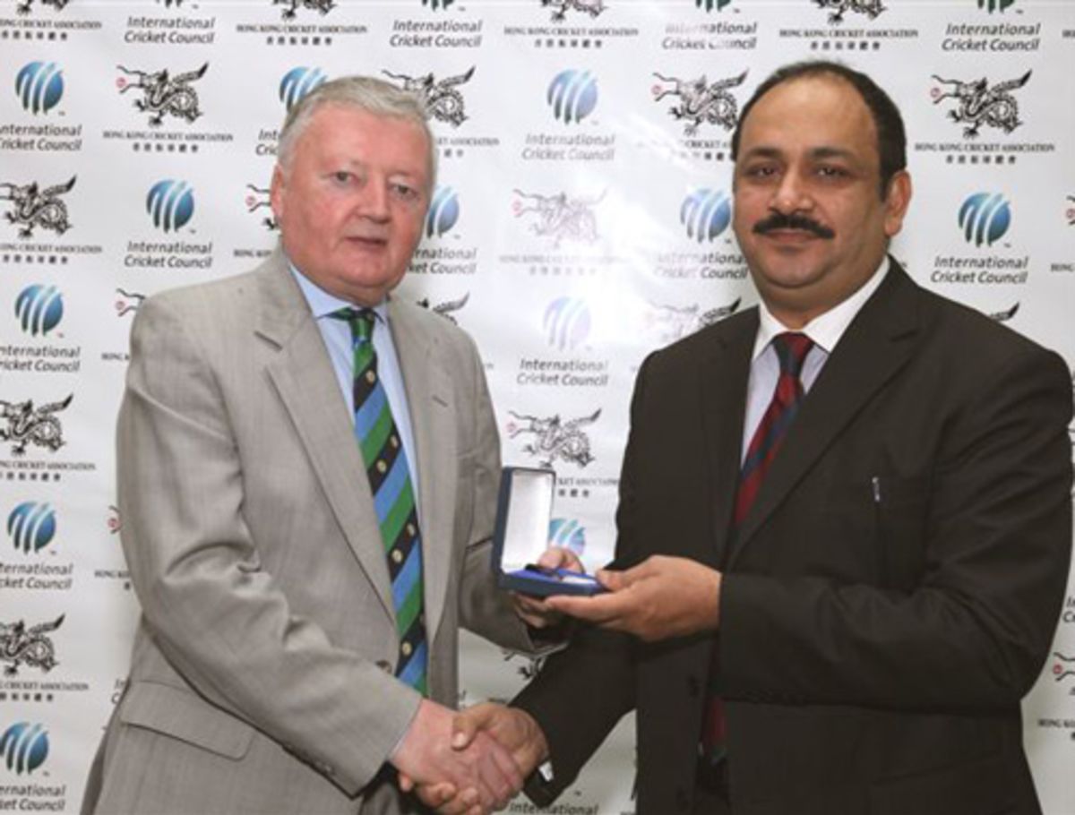 Jawad Ashraf receives his ICC Centenary Medal from ICC President David ...