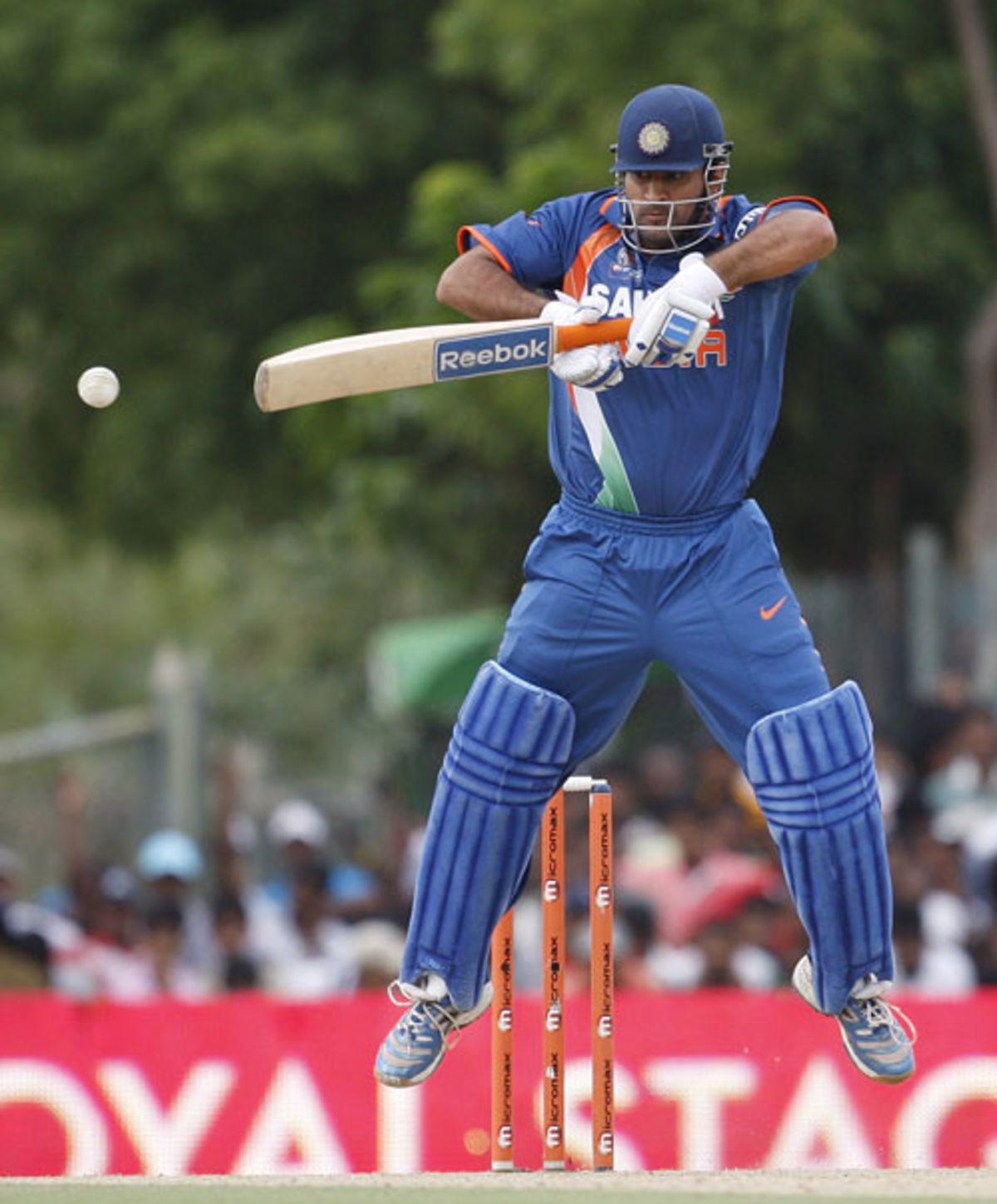 ms-dhoni-jumps-up-to-play-a-cut-shot-espncricinfo