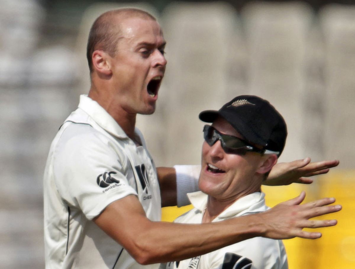 Chris Martin and Brendon McCullum are ecstatic after Rahul Dravid's dismissal, India v New Zealand, 1st Test, Ahmedabad, 4th day, November 7, 2010