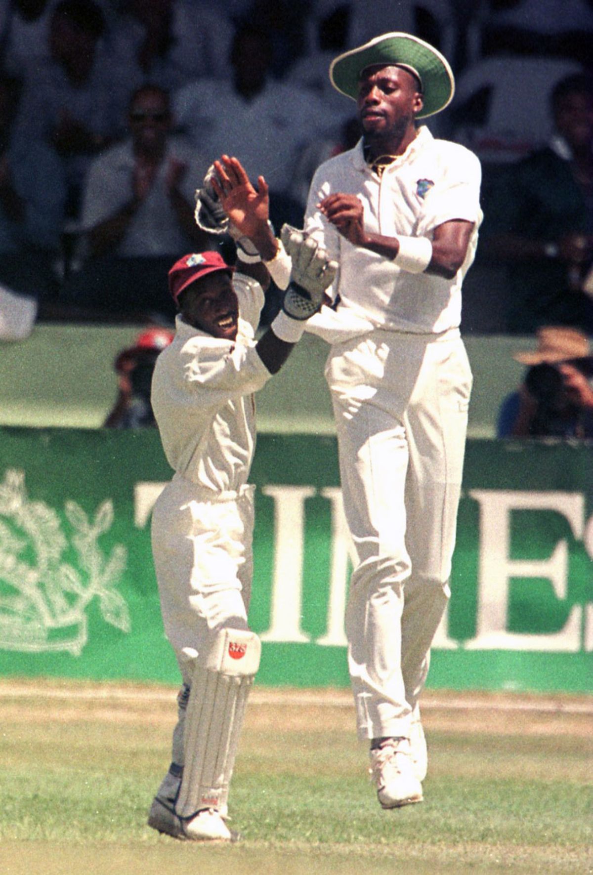 David Williams and Curtly Ambrose celebrate a wicket, West Indies v England, 5th Test, Barbados, March 12, 1998