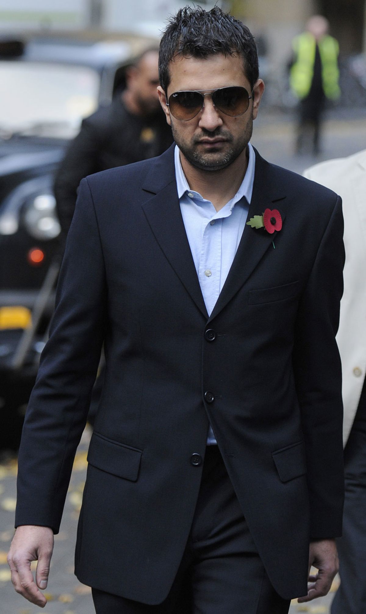 Mazhar Majeed arrives at the Southwark Crown Court for the sentencing