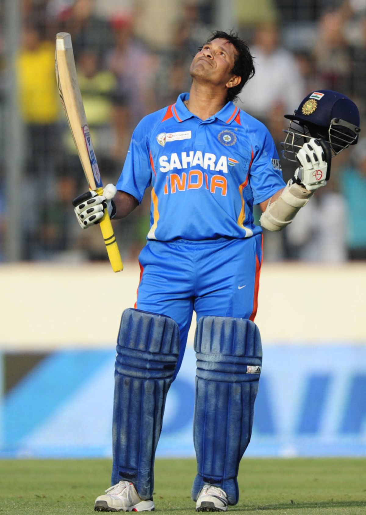 Sachin Tendulkar kisses his helmet after reaching his 100th hundred ...