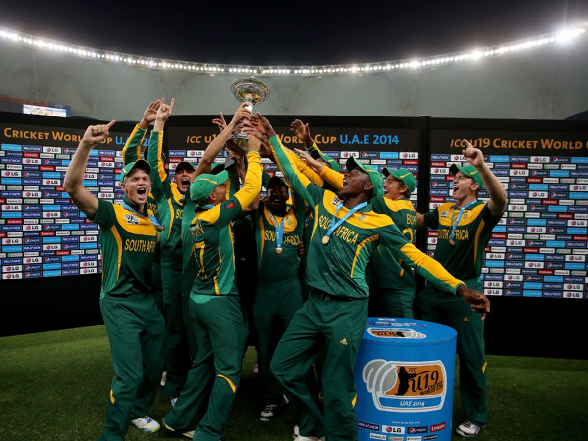 The South Africa players lift the World Cup trophy