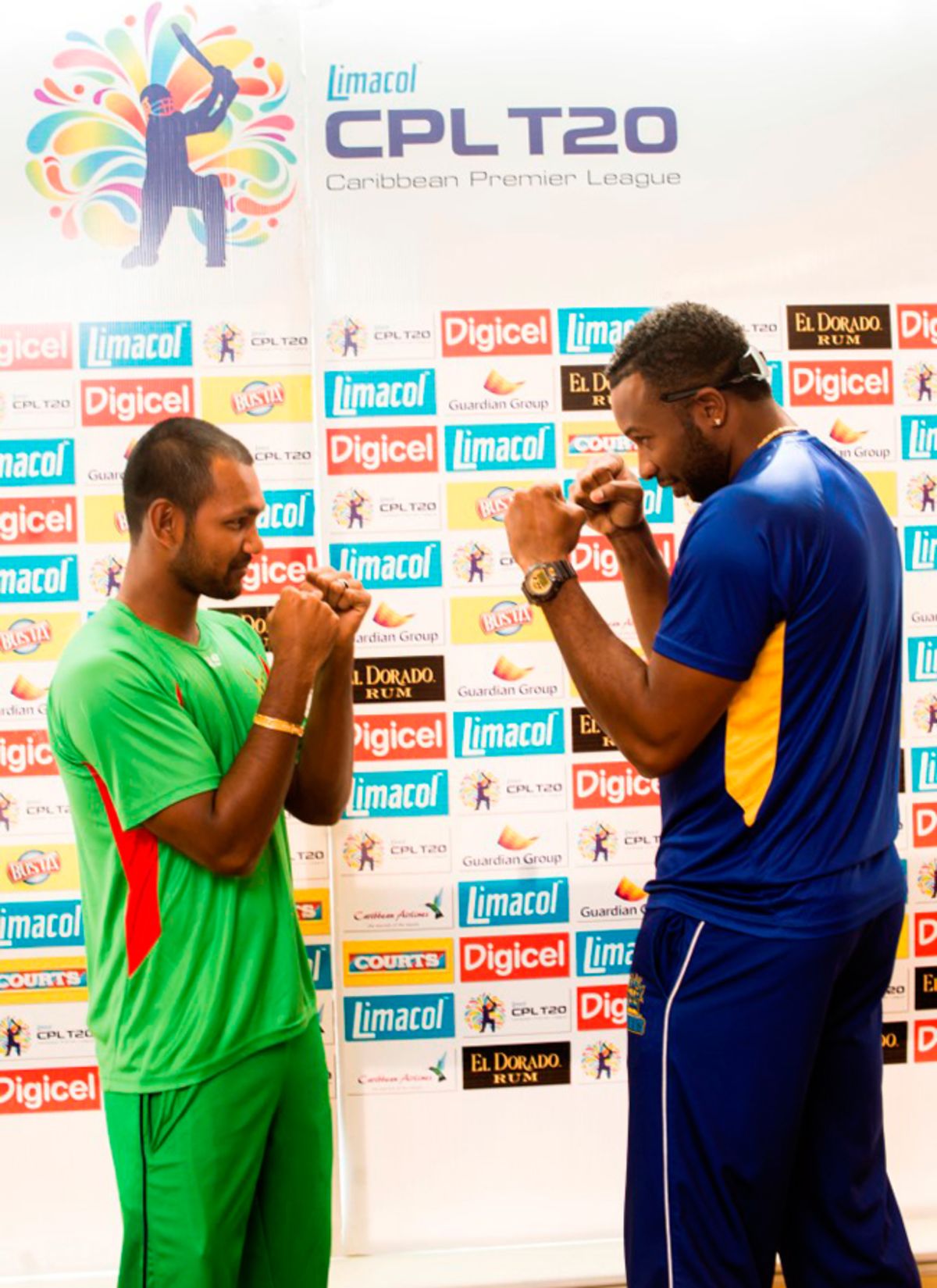 Guyana Amazon Warriors' Denesh Ramdin and Barbados Tridents' Kieron Pollard spar ahead of the CPL 2014 final, St Kitts, August 15, 2014