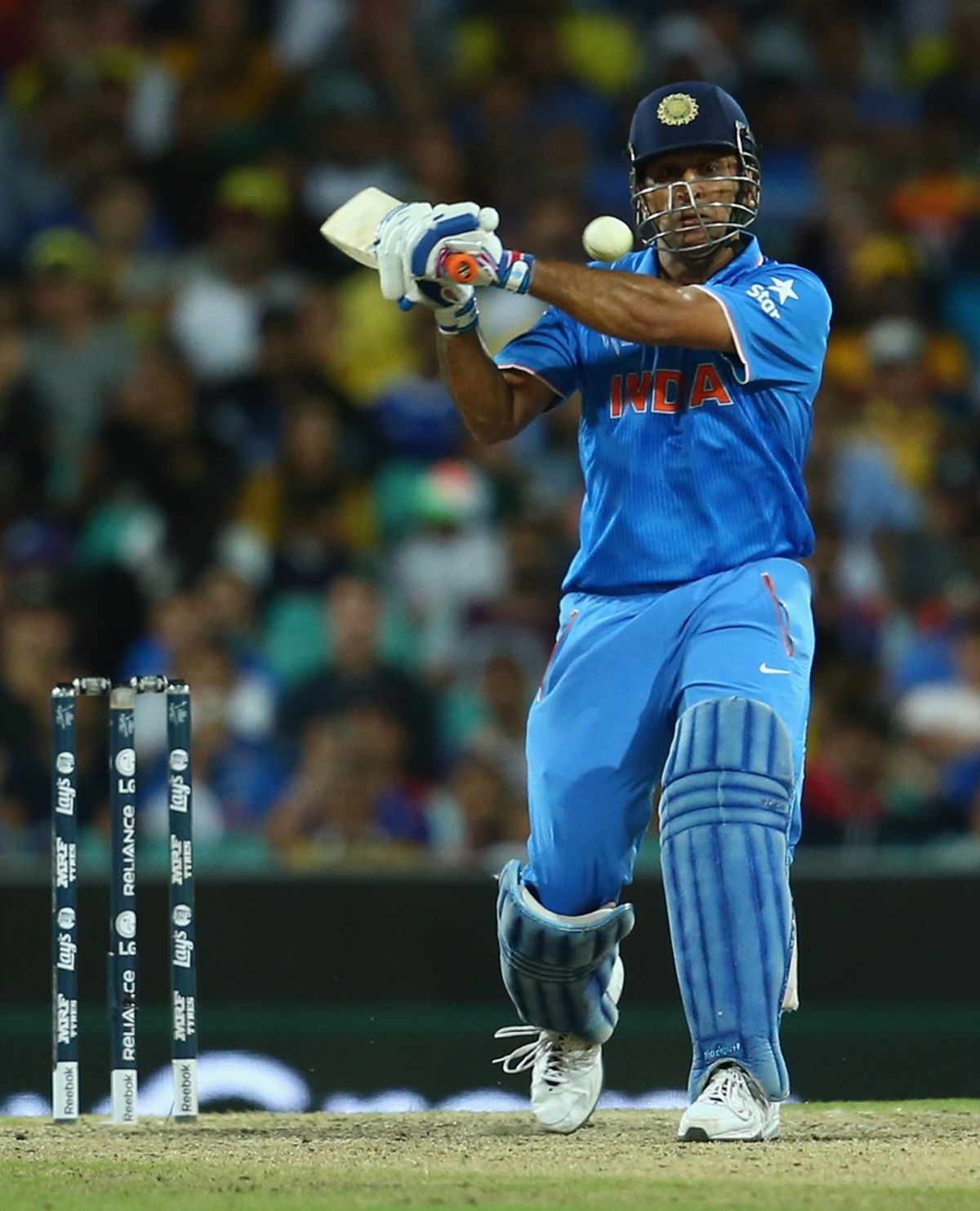 MS Dhoni winds up for a big blow, Australia v India, World Cup 2015, 2nd semi-final, Sydney, March 26, 2015