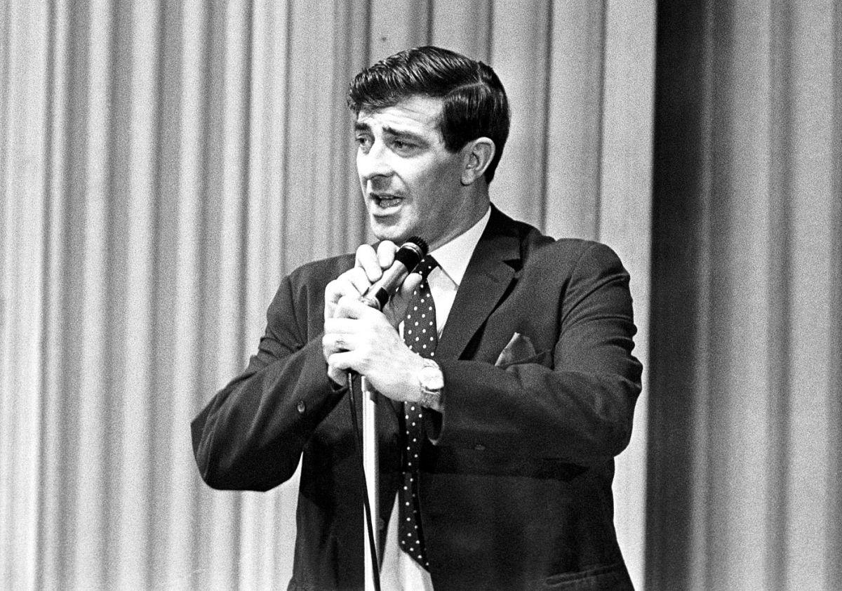 Fred Trueman makes his entrance during a stand-up comedy stint ...
