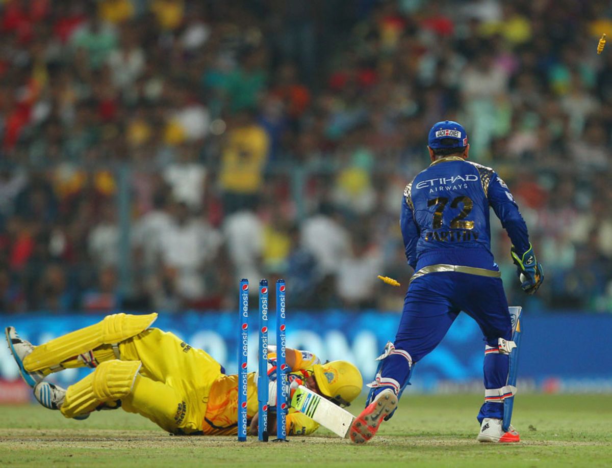 Suresh Raina is down, and out stumped, Mumbai Indians v Chennai Super Kings, IPL 2015, Final, Kolkata, May 24, 2015