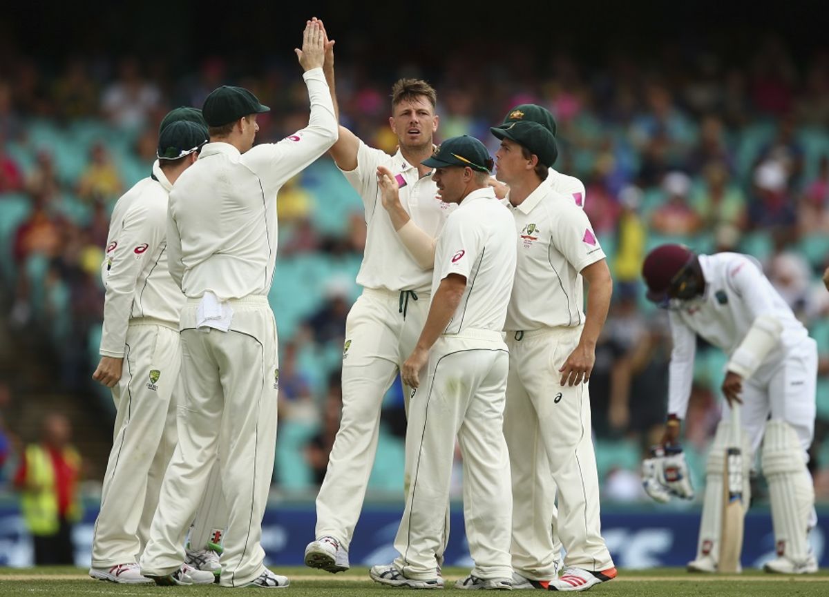 James Pattinson is mobbed by his team-mates, Australia v West Indies, 3rd Test, Sydney, 2nd day, January 4, 2016