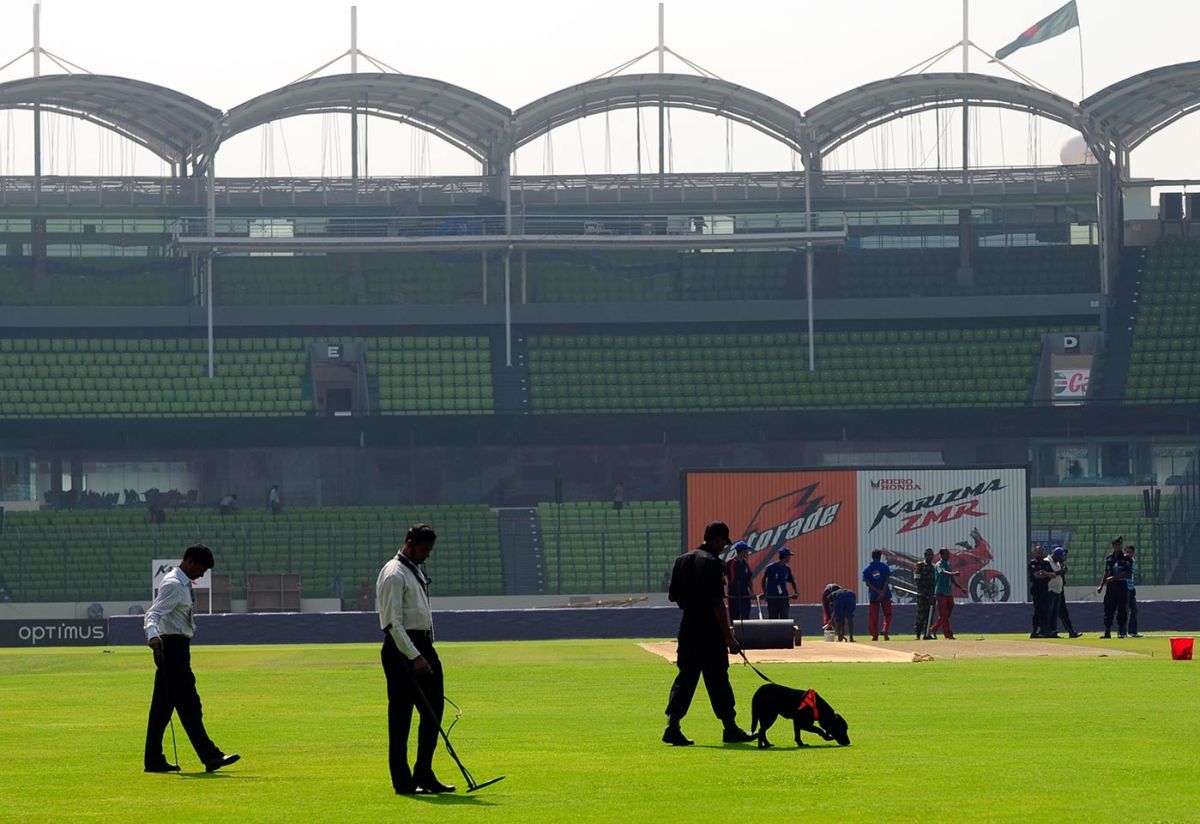 Security personnel scan the ground at the Shere Bangla National Stadium ahead of the match, Bangladesh v West Indies, World Cup, Dhaka, March 4, 2011