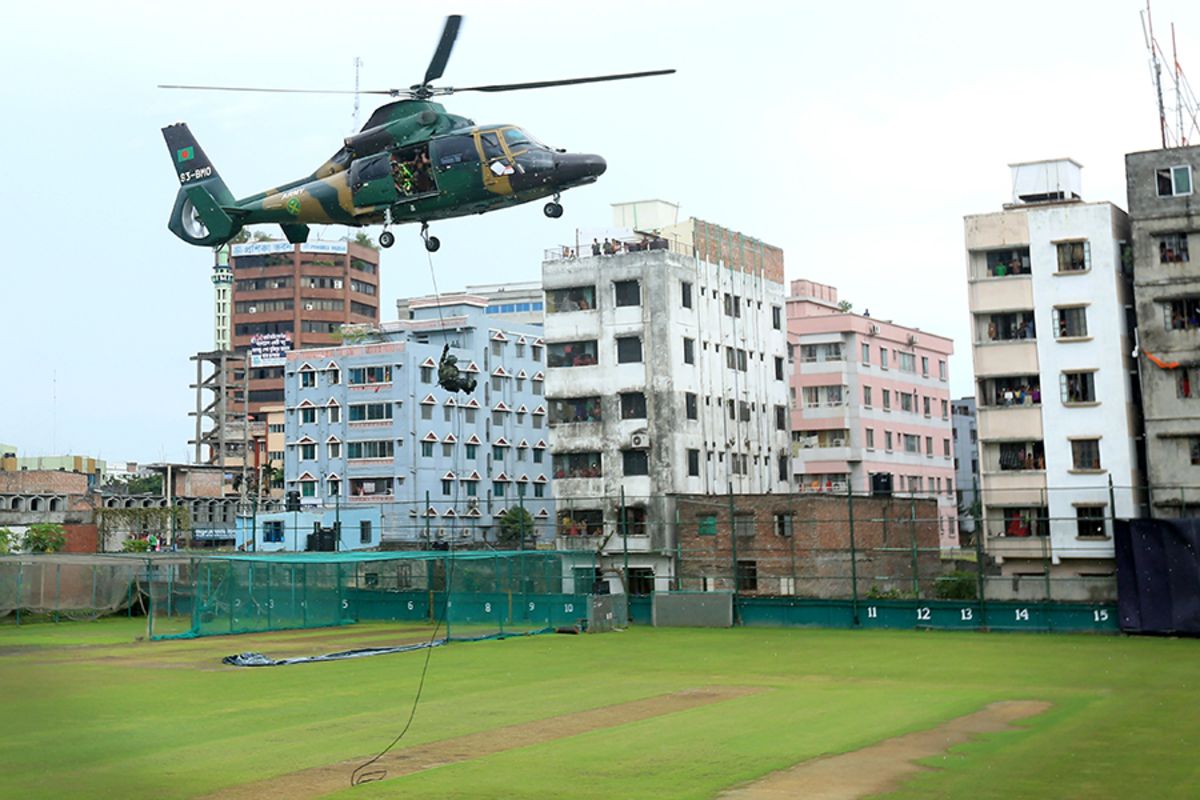 A helicopter hovers over the Academy ground near the Shere Bangla National Stadium  on the eve of the first ODI between Bangladesh and England, Mirpur, October 6, 2016