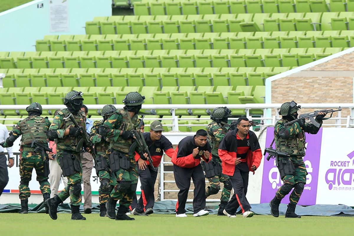 Security personnel  and commandos conduct a mock drill at the Shere Bangla National Stadium  on the eve of the first ODI between Bangladesh and England, Mirpur, October 6, 2016