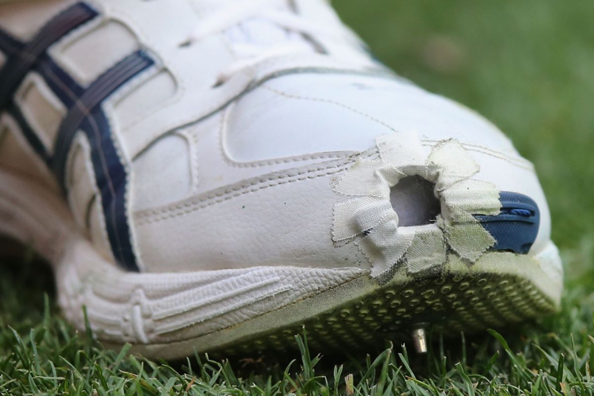 A custom hole in the shoe of Josh Hazlewood to ease the load on his foot |  