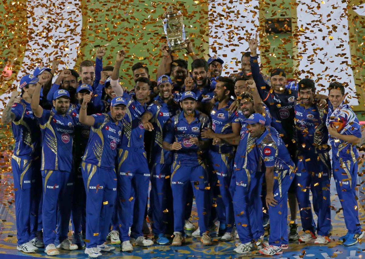 The Mumbai Indians team pose with the trophy | ESPNcricinfo.com