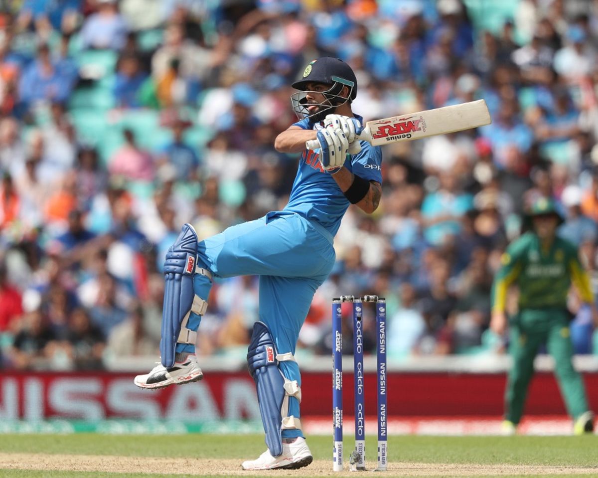 Virat Kohli watches the ball fly off his pull shot | ESPNcricinfo.com