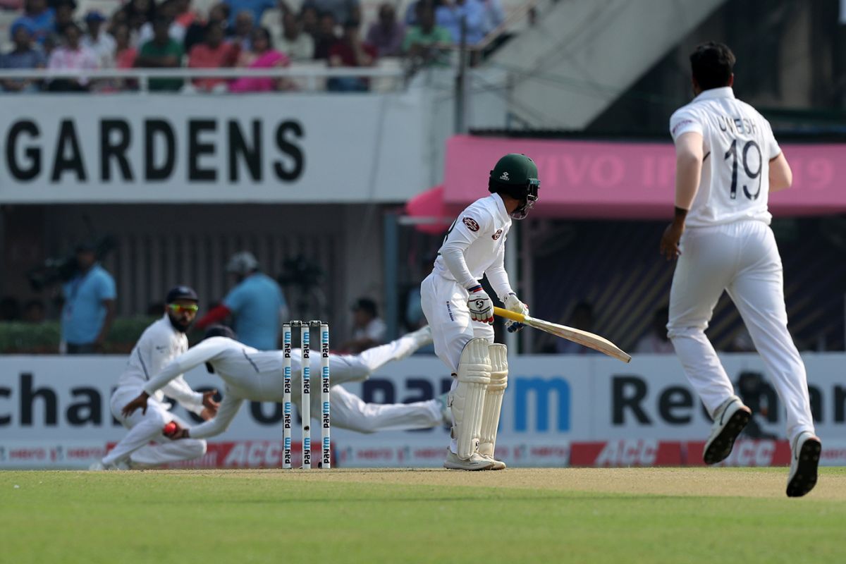 Rohit Sharma throws himself to his right to grab a one-hander off Mominul Haque's edge, India v Bangladesh, 2nd Test, 1st day, Kolkata, November 22, 2019