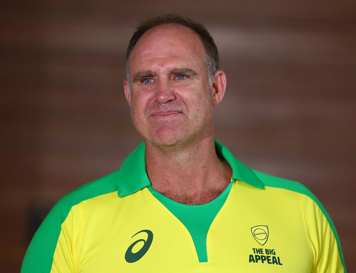 Back together Matthew Hayden and Justin Langer walk out to open the