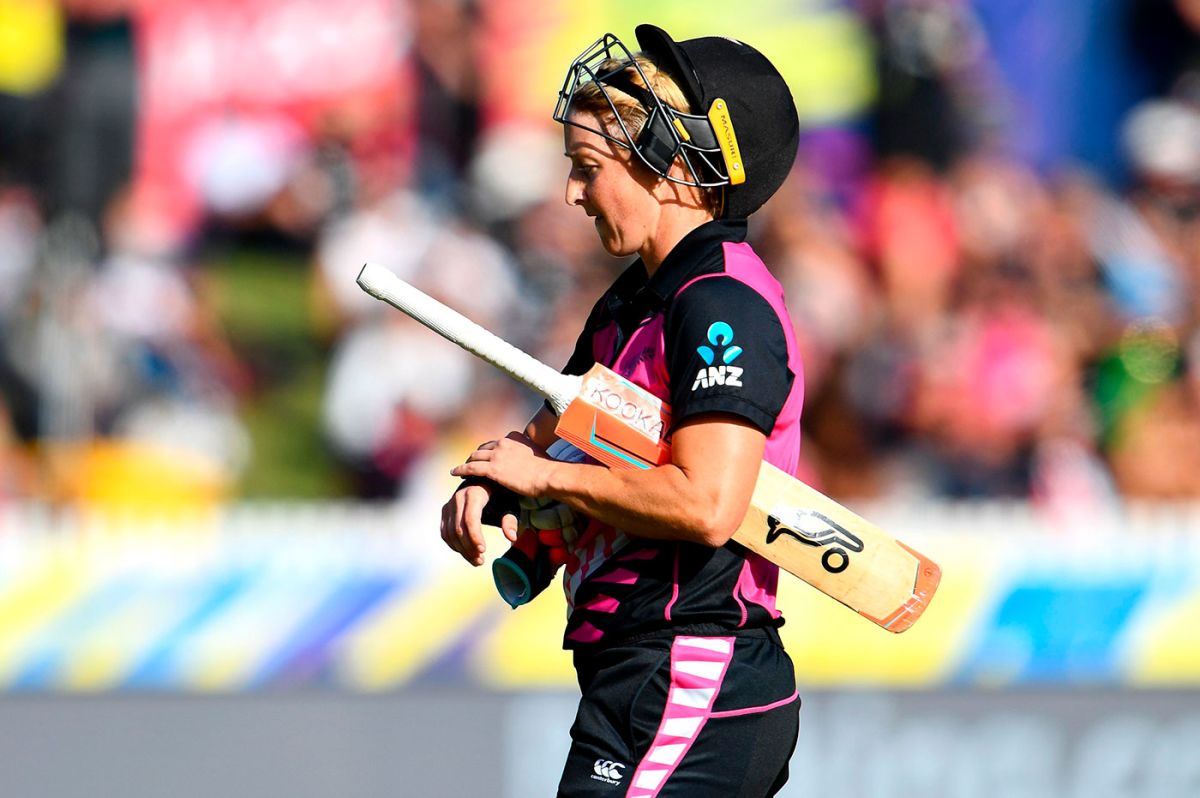 Sophie Devine leaves the field after her dismissal