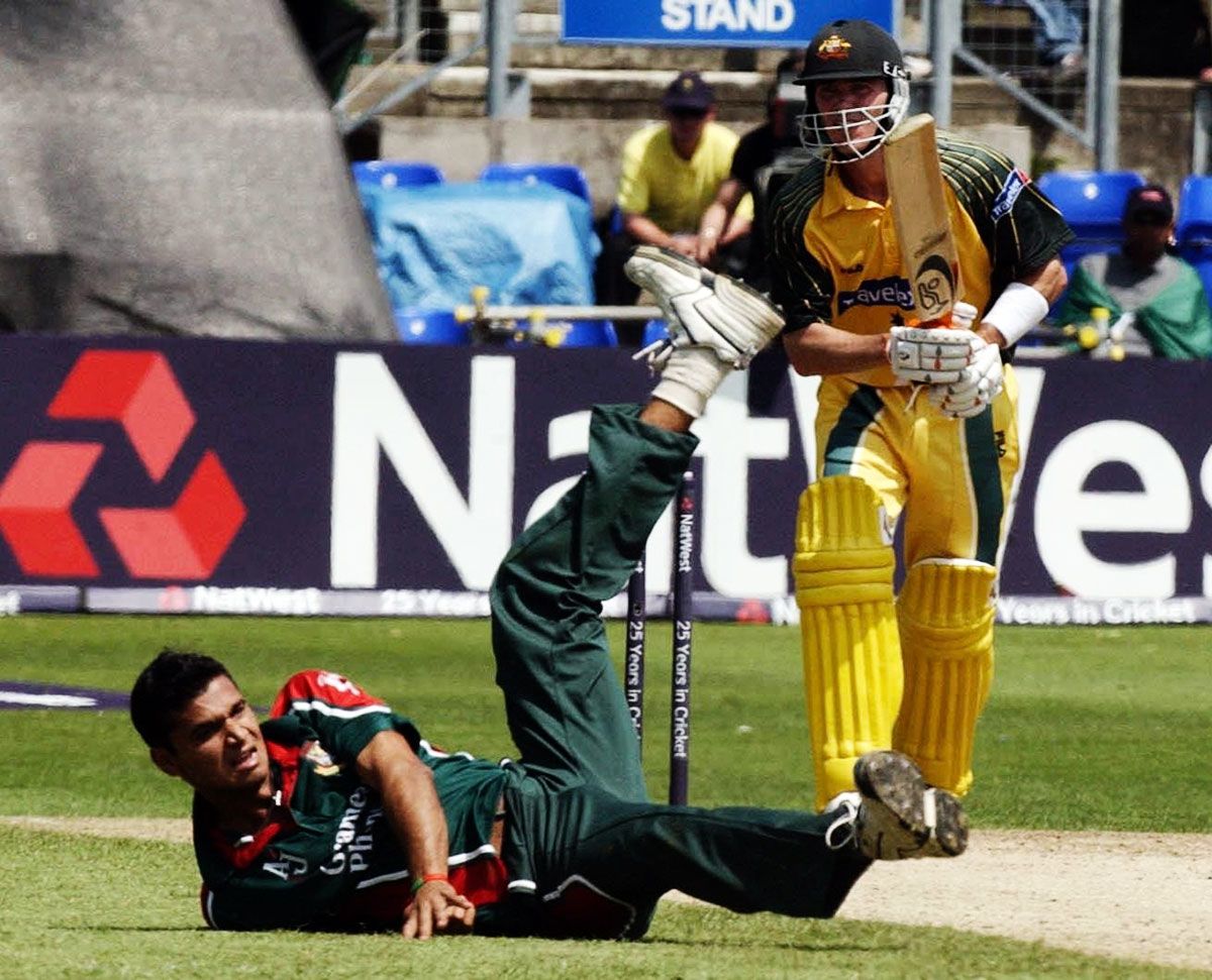 Mashrafe Mortaza falls to the ground while trying to stop a shot from Damien Martyn, Australia v Bangladesh, NatWest Series, Cardiff, June 18, 2005