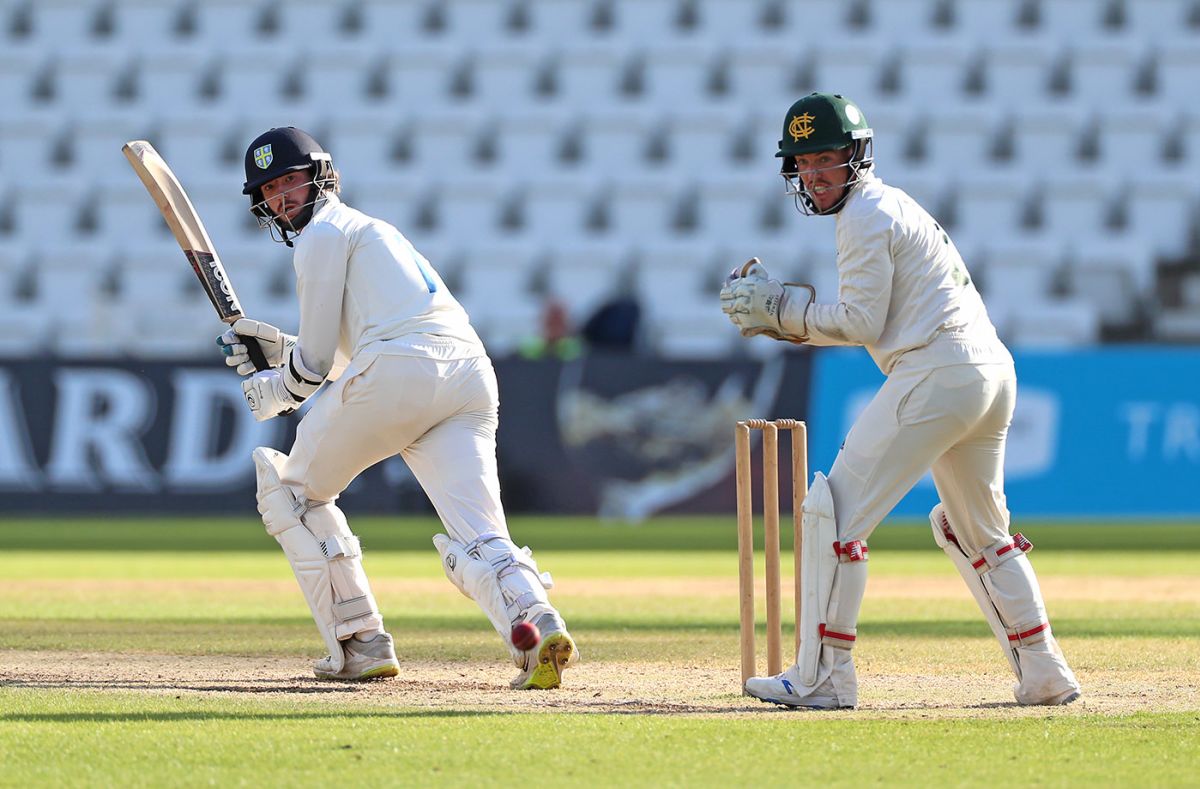 Durham's Michael Jones works the ball fine