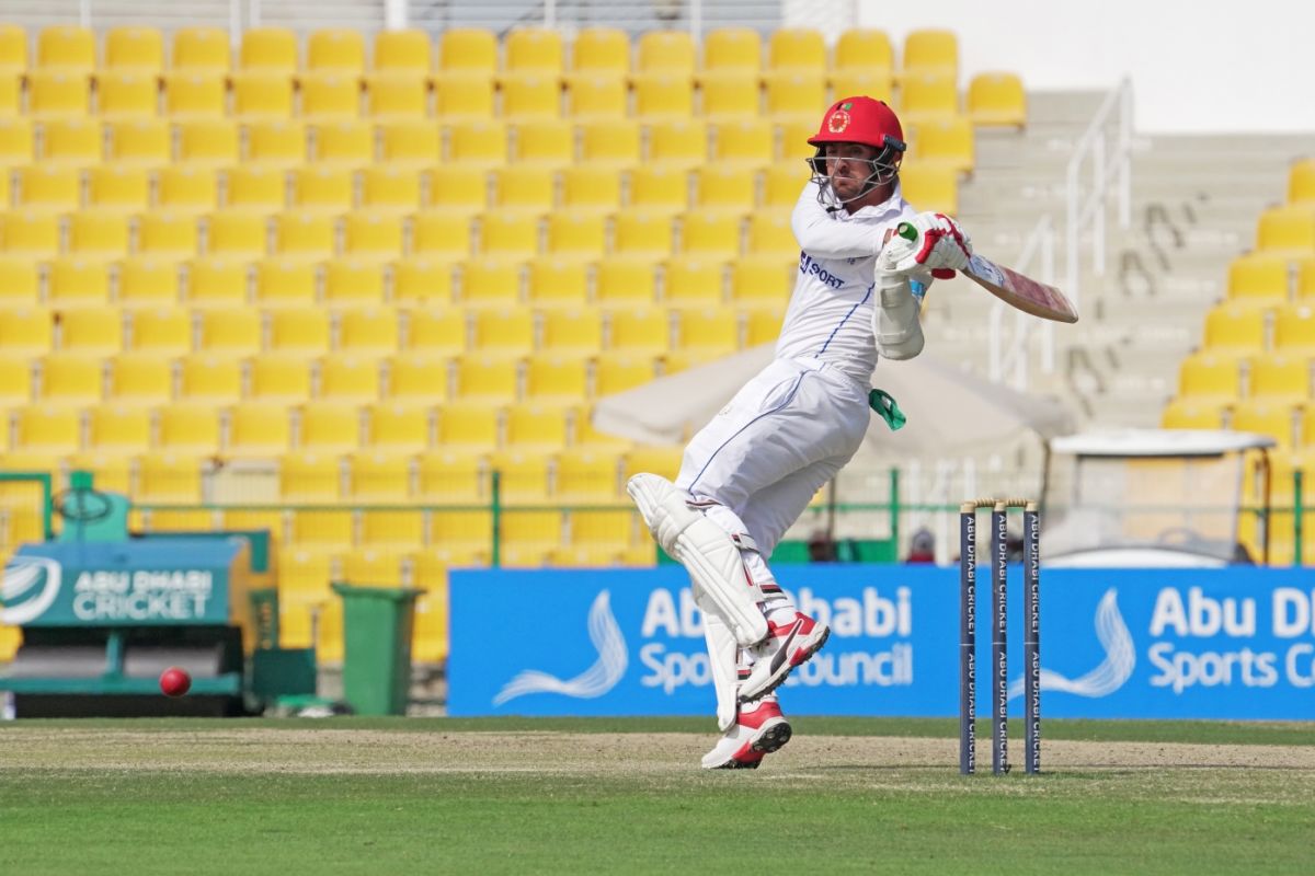 Nasir Jamal raises his bat on scoring a maiden Test halfcentury