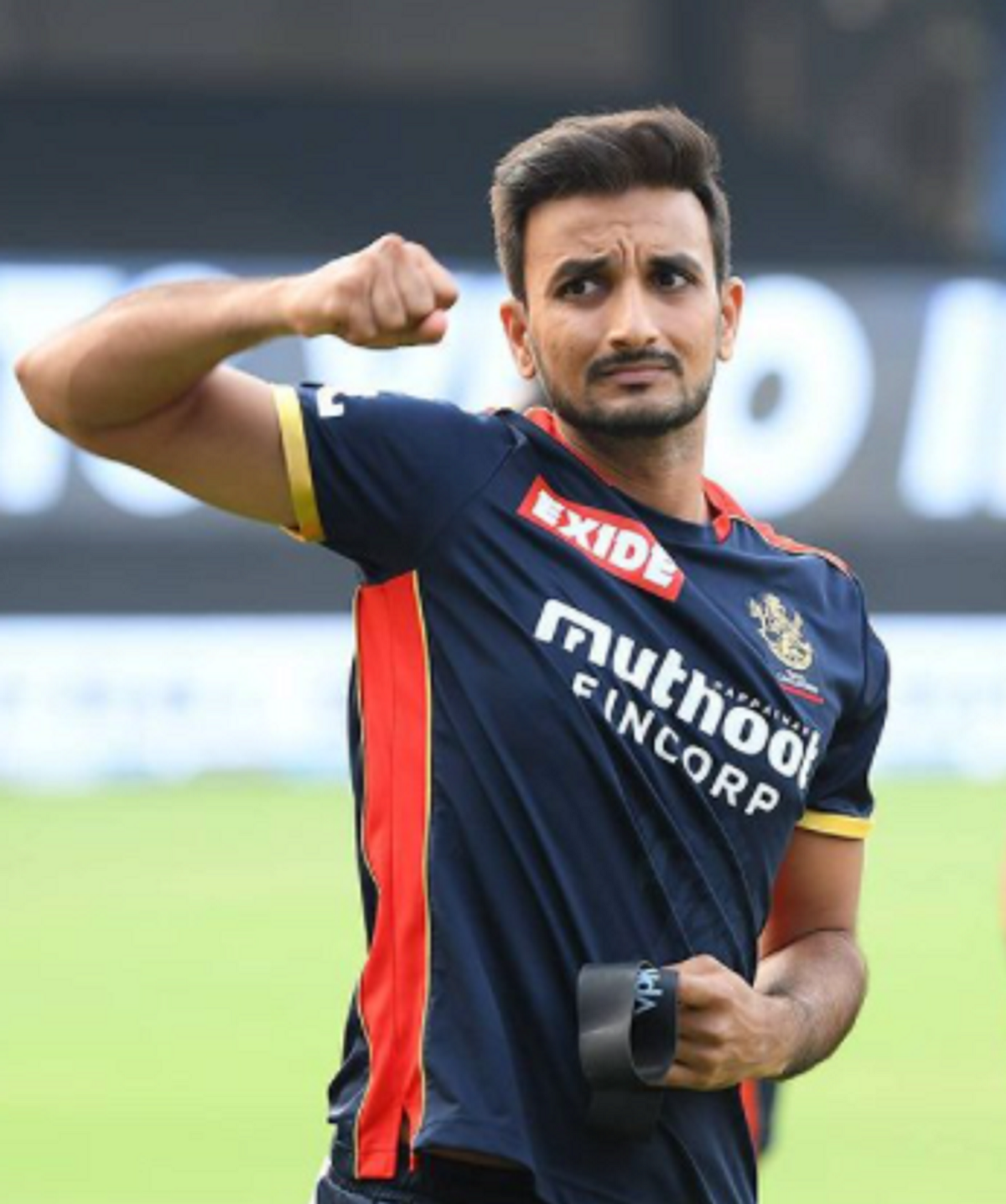 Harshal Patel reacts in the field during a practice session ...