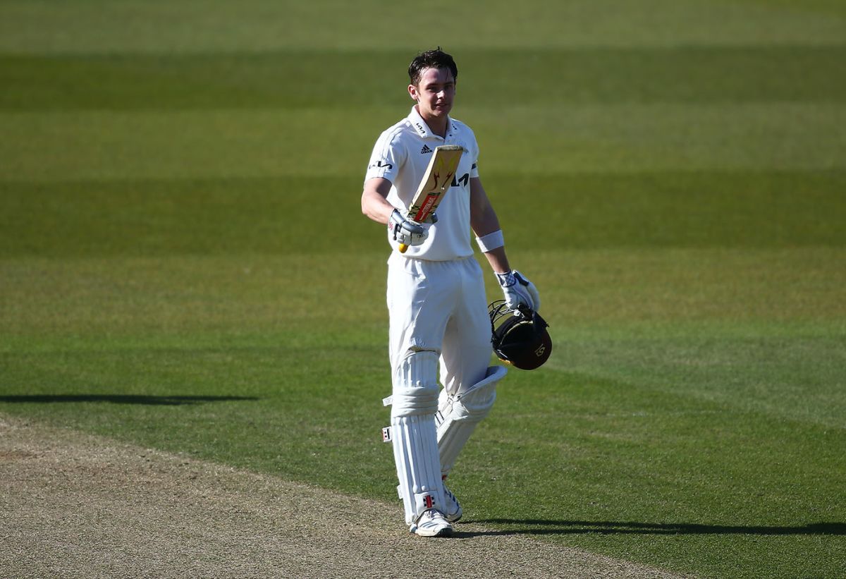 Jamie Smith celebrates his century