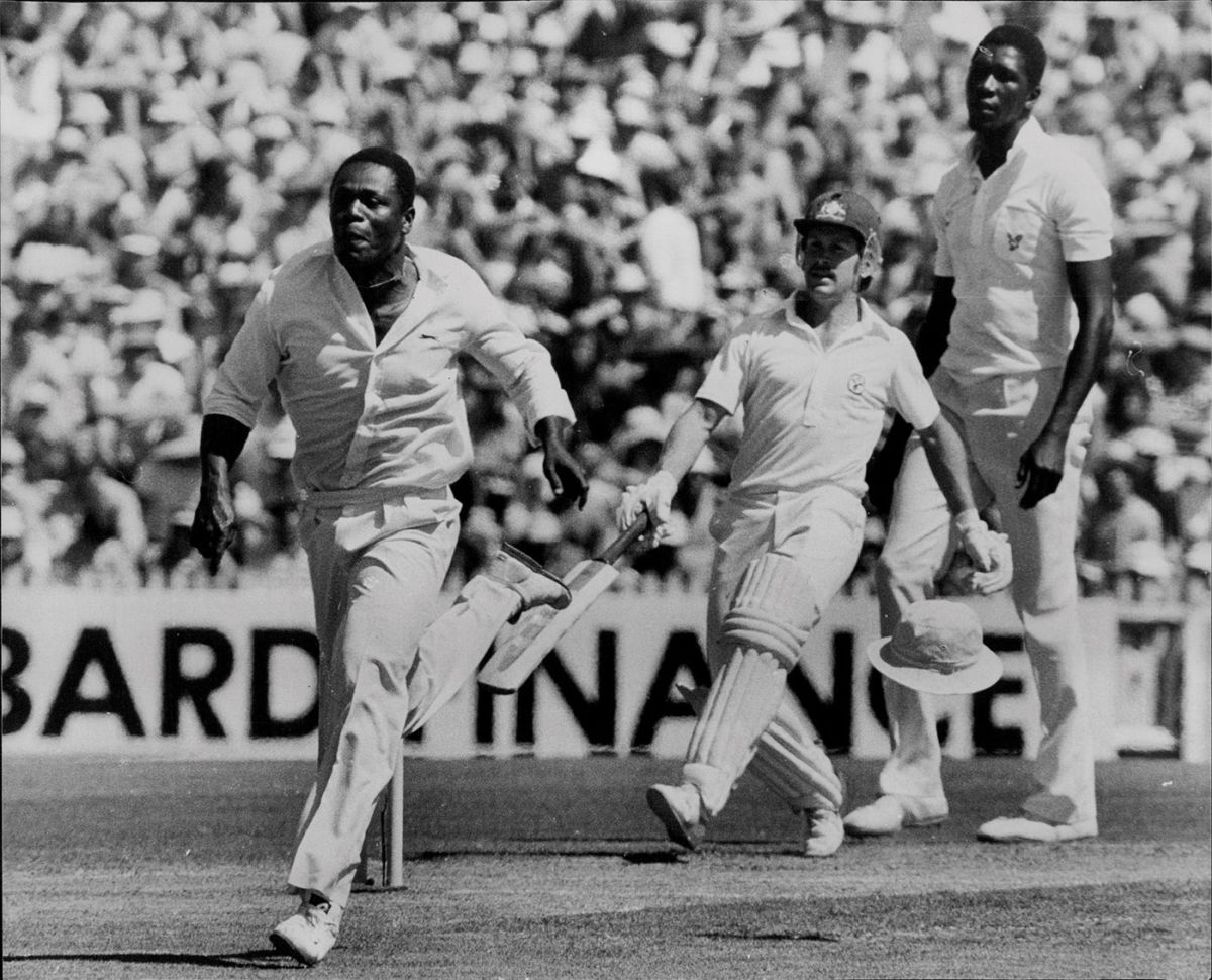 Desmond Haynes chases after a ball from Bruce Laird off the bowling of