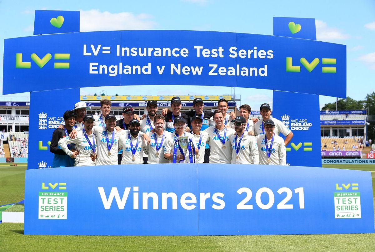 New Zealand players with the trophy after clinching the series against