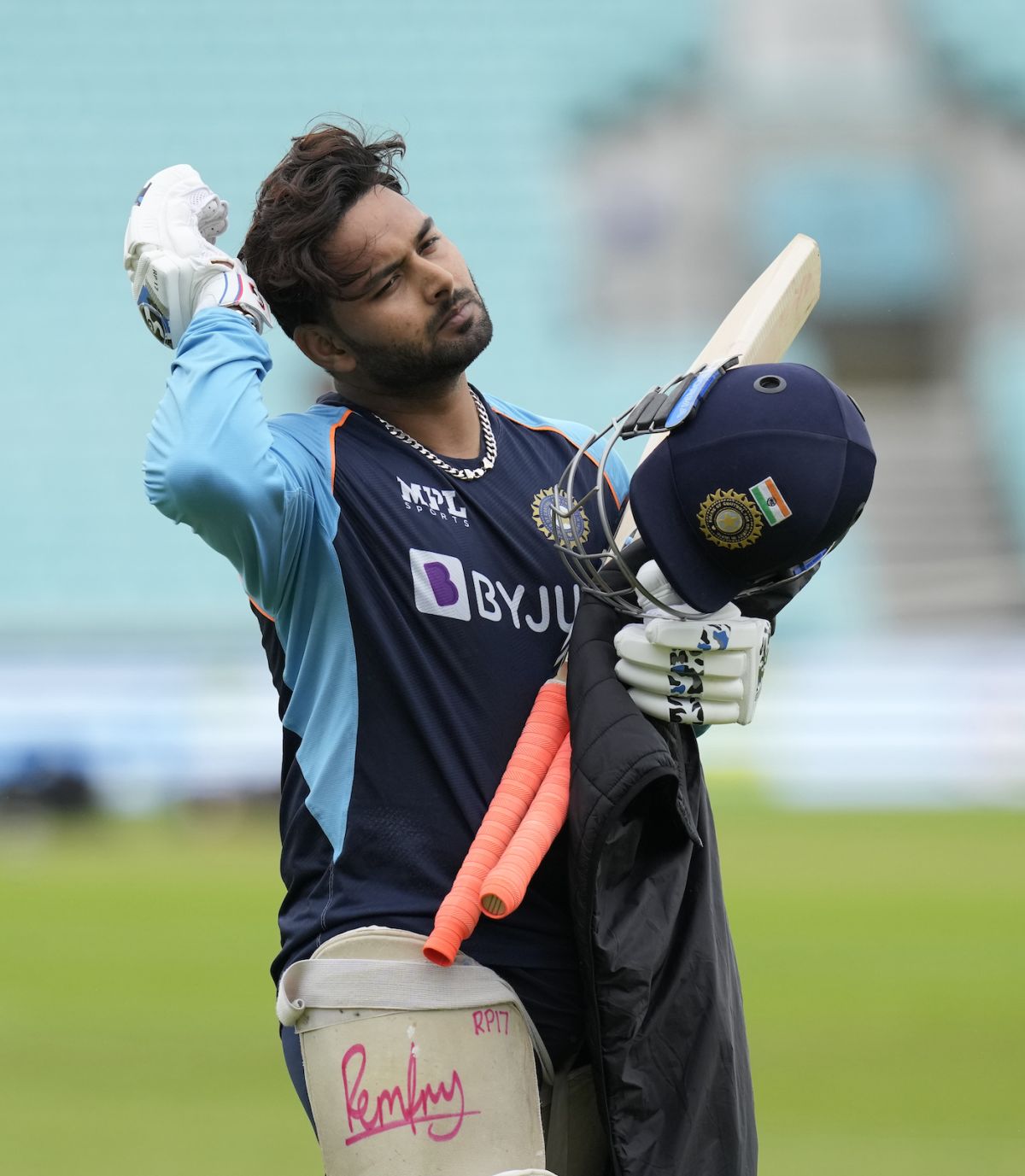 Rishabh Pant walks back after a batting session 