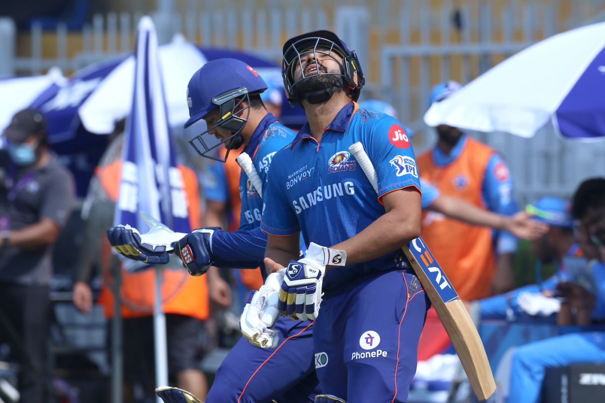 Quinton de Kock and Rohit Sharma walk out to bat | ESPNcricinfo.com