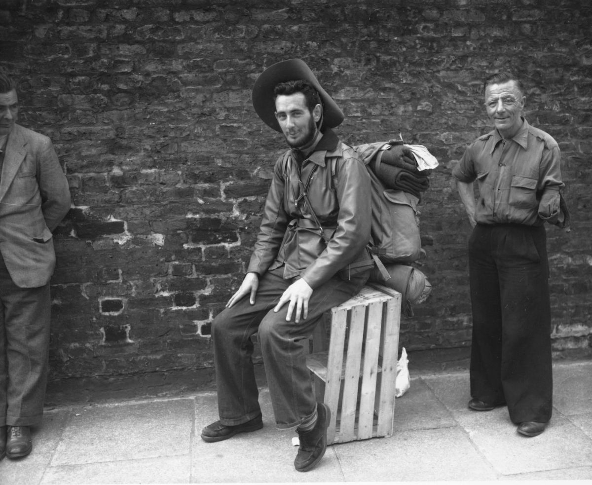 Hitchhiker Jack Perry of Melbourne outside comes to the Oval for the