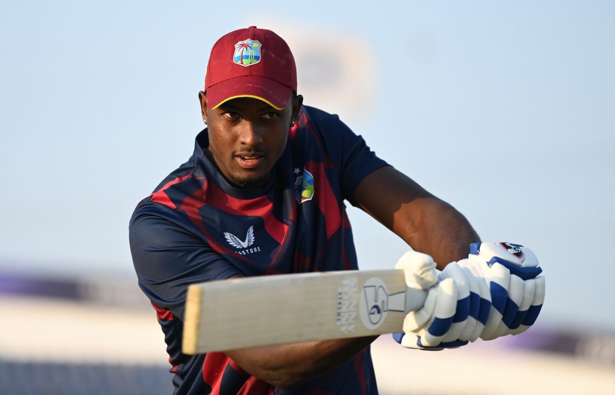 Jason Holder has a hit before the game