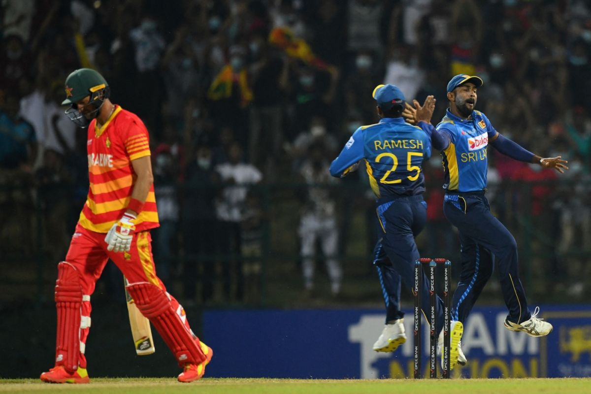 Sri Lanka celebrate seeing the end of Craig Ervine's innings, Sri Lanka vs Zimbabwe, 3rd ODI, Pallekele, January 21, 2022
