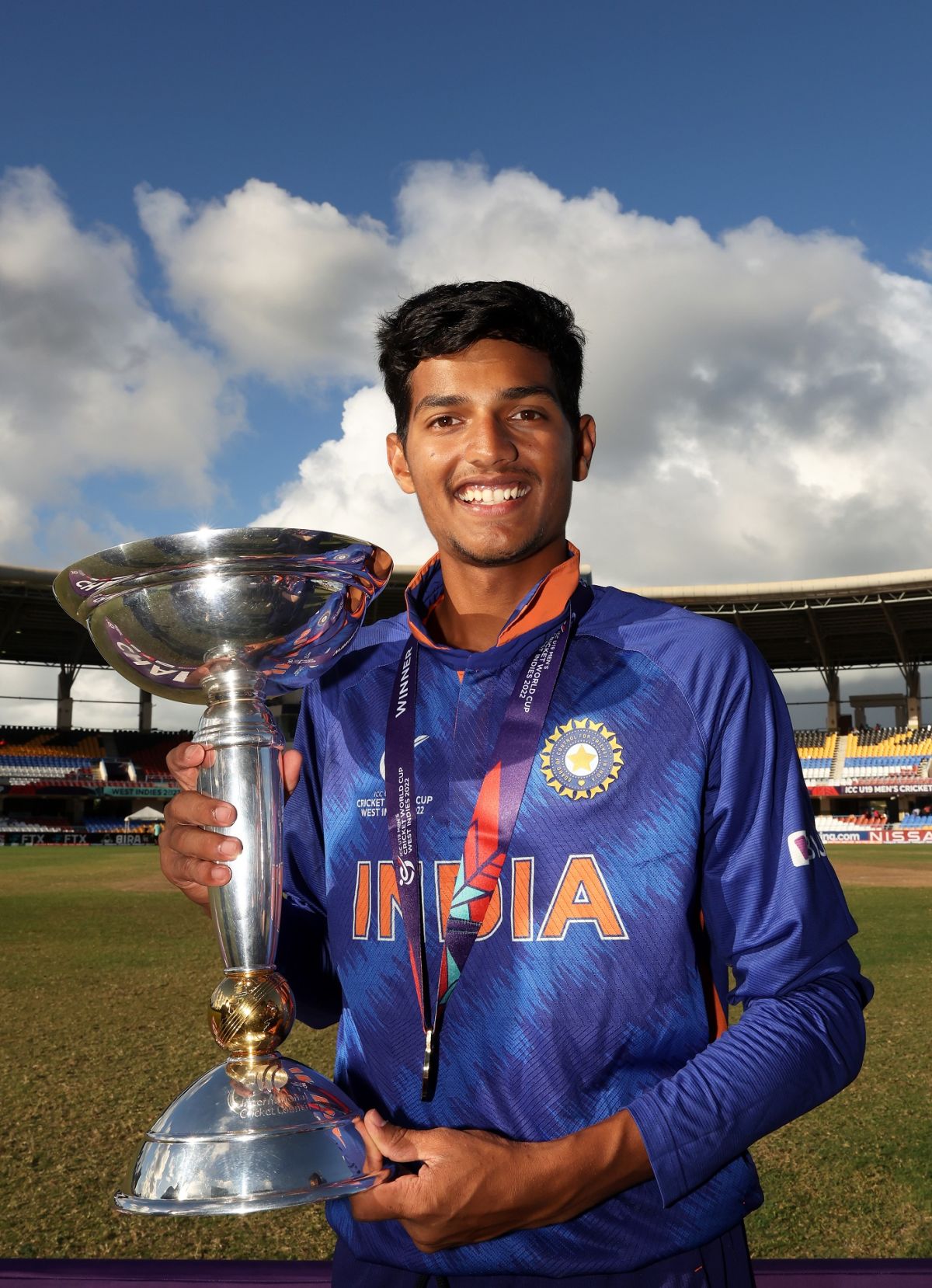 Shaik Rasheed kisses the Under19 World Cup trophy
