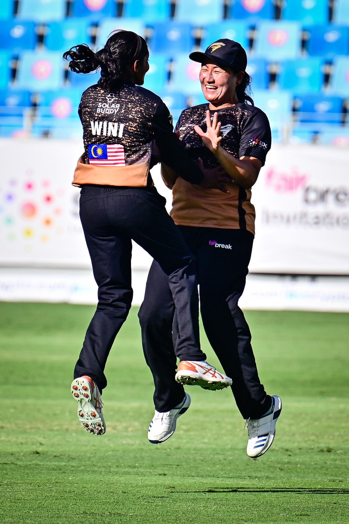 Winifred Duraisingam and Sita Rana Magar celebrate a wicket ...