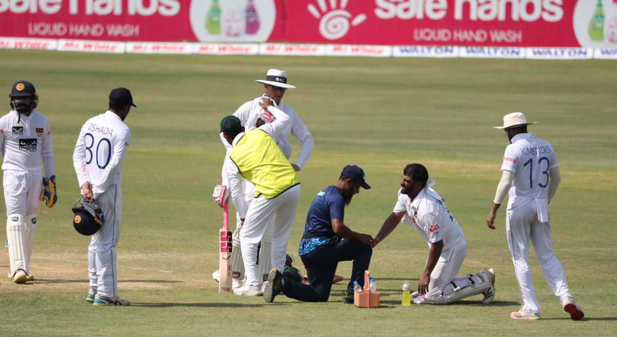 Tamim Iqbal gets tended to by the team physio, Bangladesh vs Sri Lanka, 1st Test, Chattogram, 3rd day, May 17, 2022