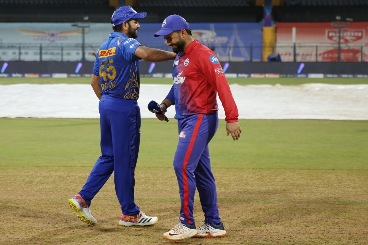 Rohit Sharma and Rishabh Pant at the toss with a slight drizzle around, Mumbai Indians vs Delhi Capitals, IPL 2022, Wankhede Stadium, Mumbai, May 21, 2022