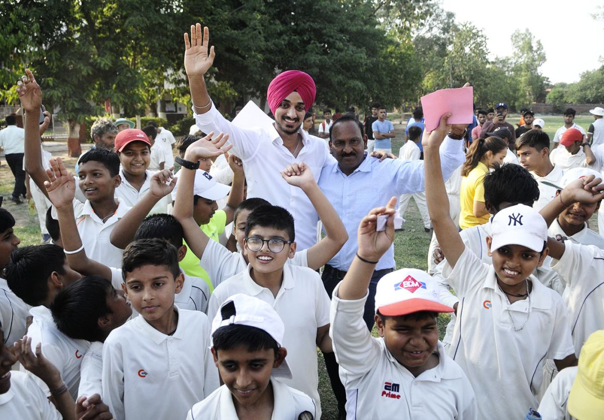 Arshdeep Singh at his academy with his coach Jaswant Rai and students, Chandigarh, June 11, 2021