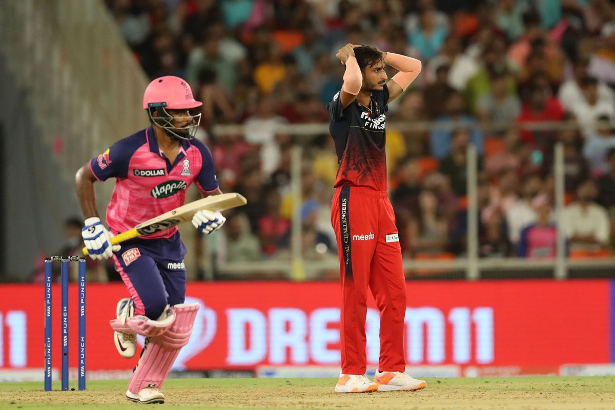 Sanju Samson crosses for a run as Shahbaz Ahmed - who was quite expensive on the night - looks on distraught, Rajasthan Royals vs Royal Challengers Bangalore, IPL 2022 Qualifier 2, Ahmedabad, May 27, 2022