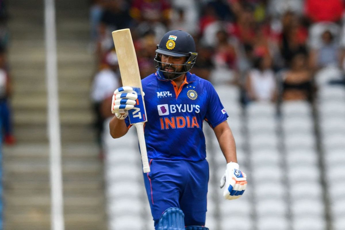 Rohit Sharma raises his bat after getting to a half-century, West Indies vs India, 1st T20I, Tarouba, July 29, 2022 