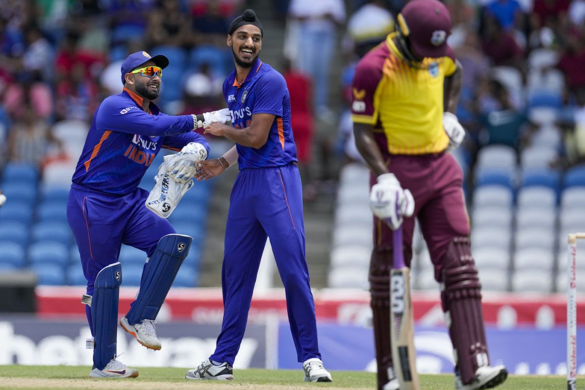 Arshdeep Singh and Rishabh Pant share a light moment while celebrating Kyle Mayers' wicket, West Indies vs India, 1st T20I, Tarouba, July 29, 2022