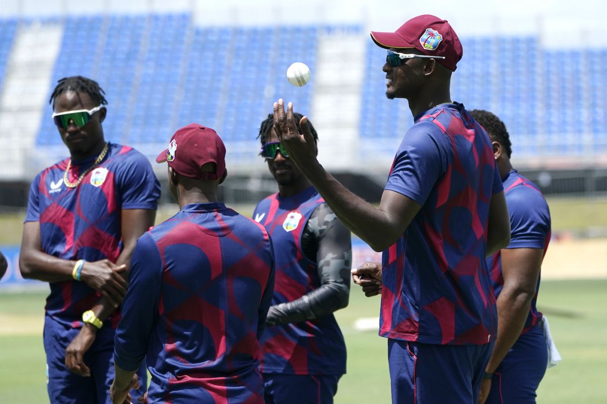 Jason Holder attends a training session with teammates