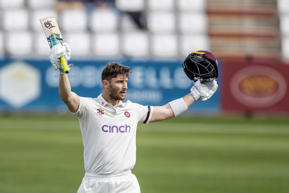 Rob Keogh raises his bat on reaching a century | ESPNcricinfo.com