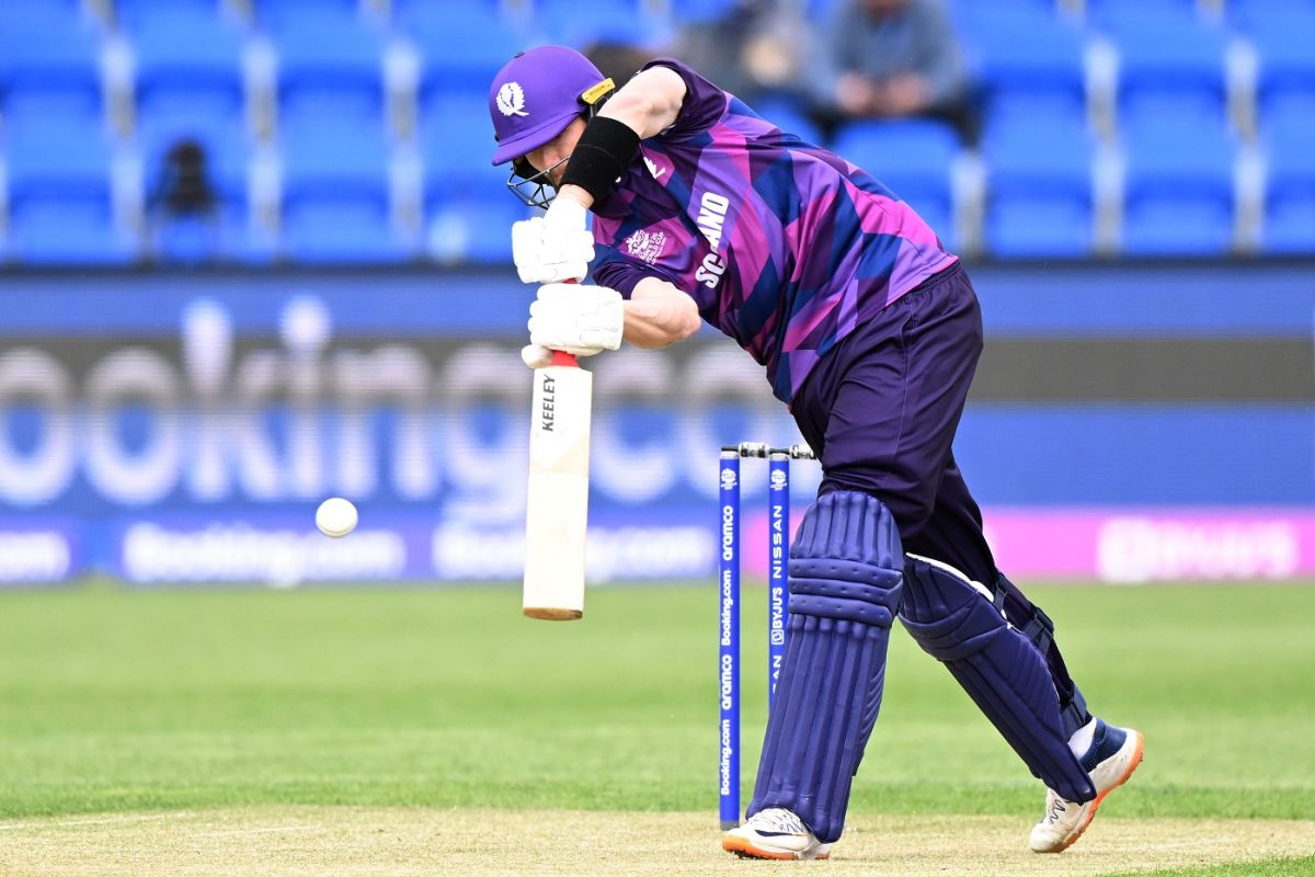 Michael Jones drives one firmly down the ground, West Indies vs Scotland, Men's T20 World Cup 2022, First round, Group B, Hobart, October 17, 2022