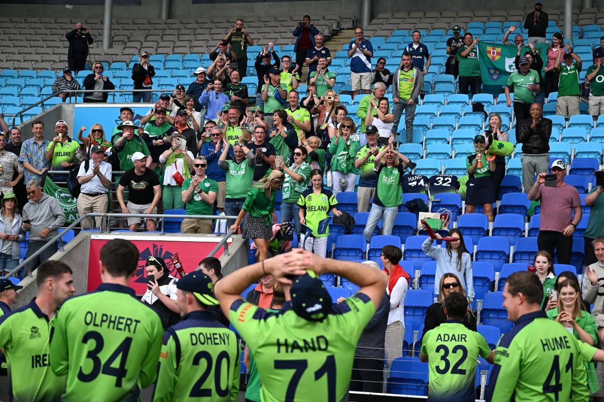 The Ireland squad members celebrate with their fans | ESPNcricinfo.com