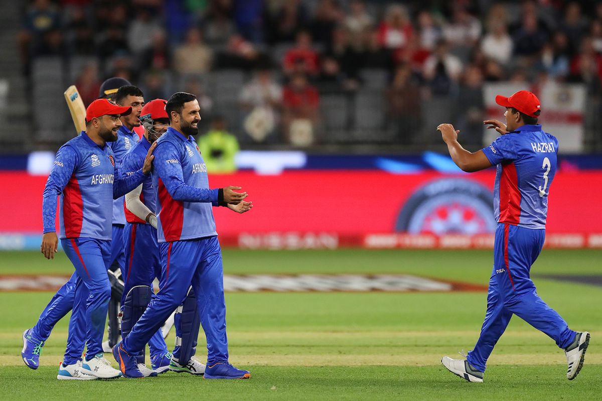 Fazalhaq Farooqi celebrates Jos Buttler's wicket | ESPNcricinfo.com