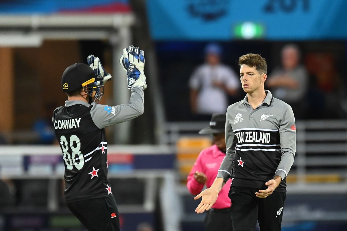 Devon Conway and Mitchell Santner celebrate after getting Alex Hales