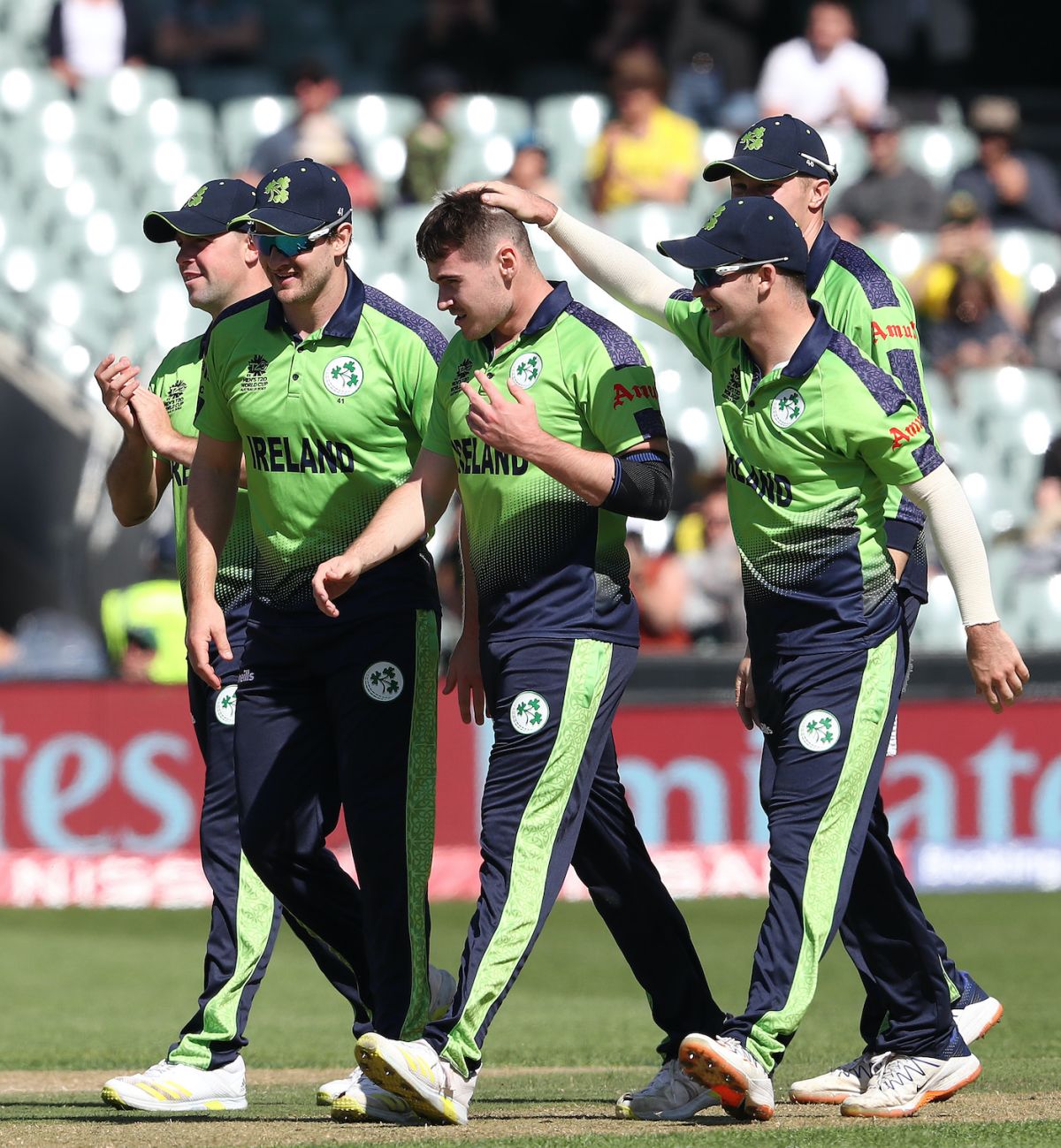 Hat-trick taker Josh Little is congratulated by his team-mates, Ireland vs New Zealand, ICC Men's T20 World Cup 2022, Adelaide, November 4, 2022

