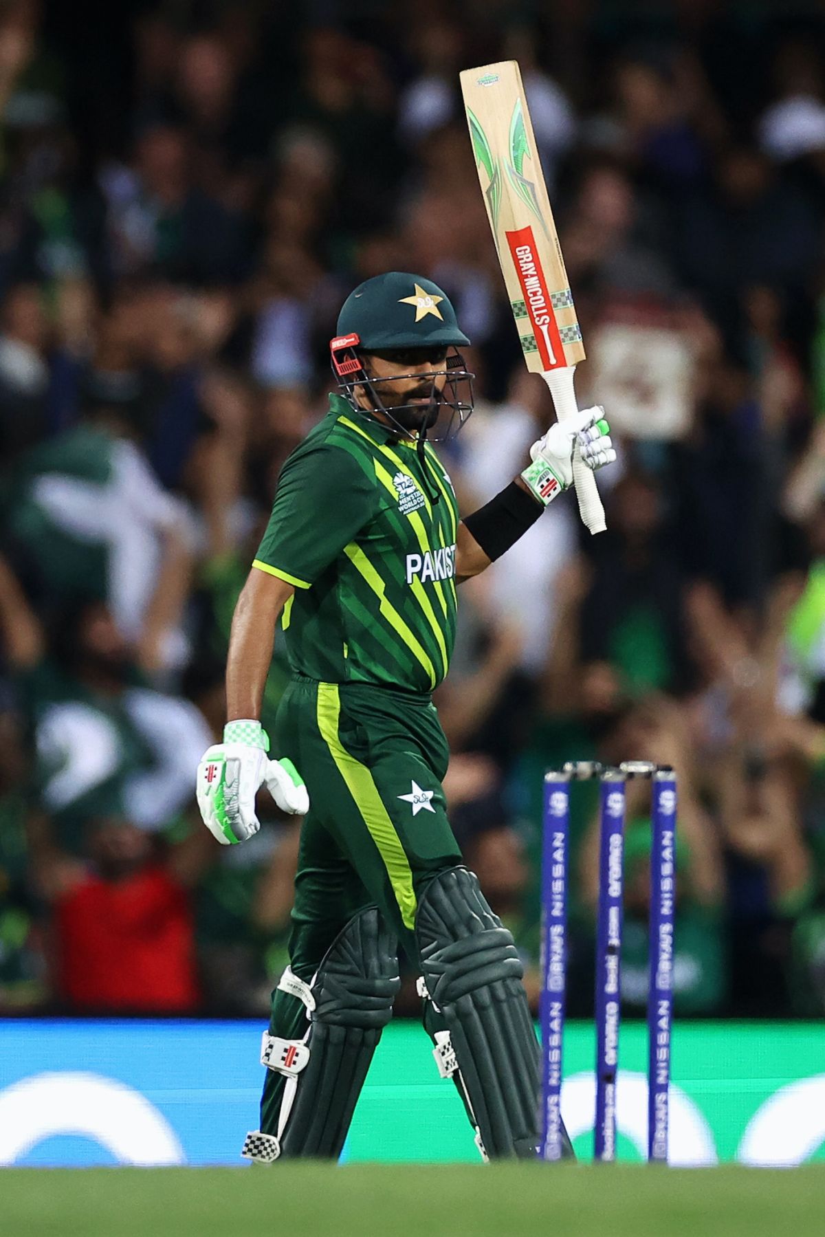 babar-azam-raises-his-bat-upon-getting-to-fifty-espncricinfo